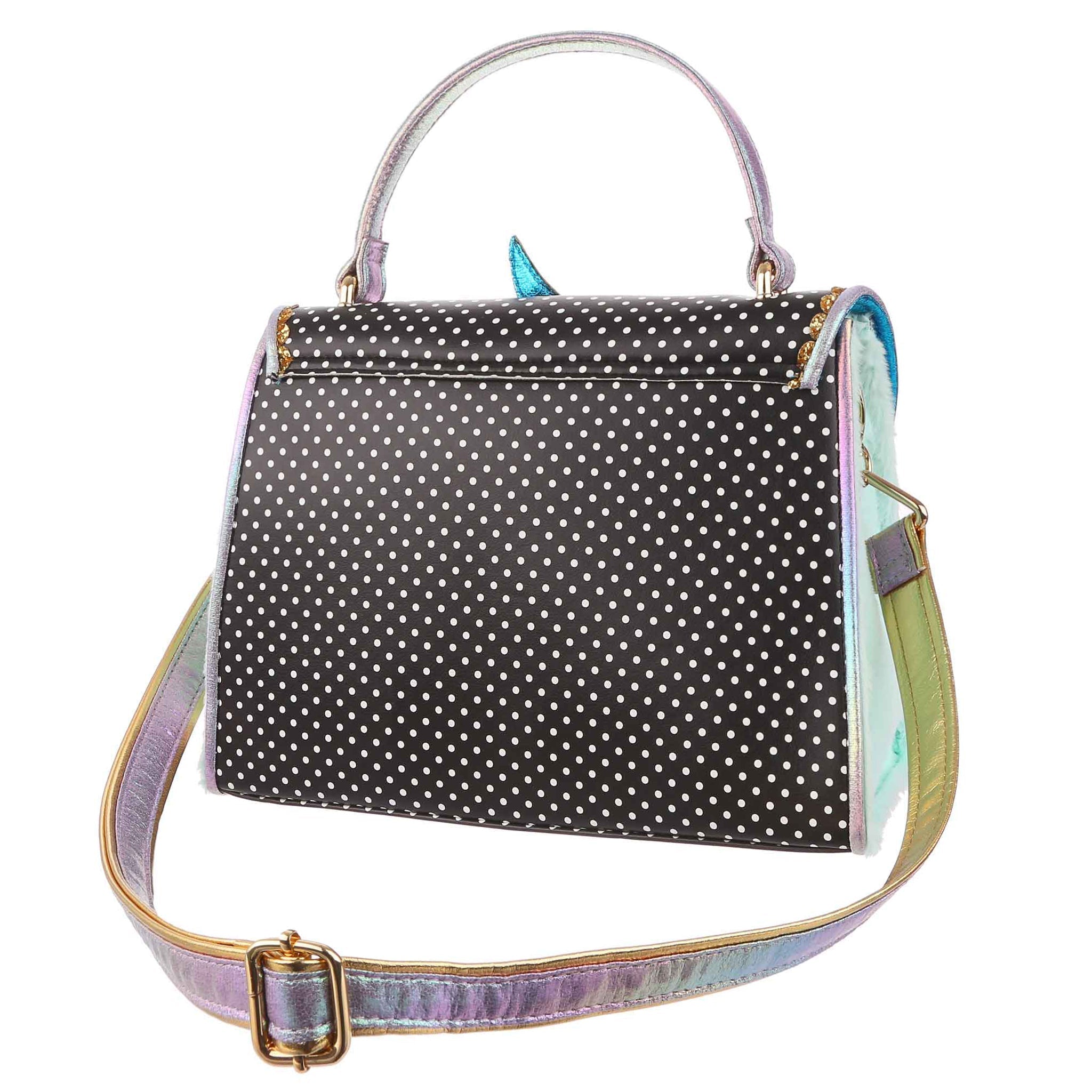 Medium sized black and white polka dot bag with an iridescent lilac handle and matching removable shoulder strap.